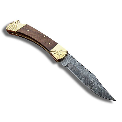couteau de poche avec manche en bois et or